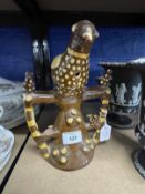 Early 19th cent. Ceramics: Pottery slip ware whistle in the form of a bird, possible cuckoo, perched