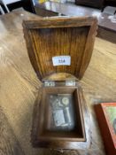 Collectables: Early 20th cent. Oak music box in the shape of a barrel on a stand with hinged lid,