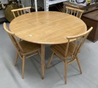 Mid 20th cent. Ercol ash oval drop leaf table and four model 391 stick back chairs with sticks