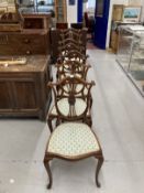 Edwardian inlaid mahogany Hepplewhite style chair, shield shaped backs, cabriole legs, two carvers
