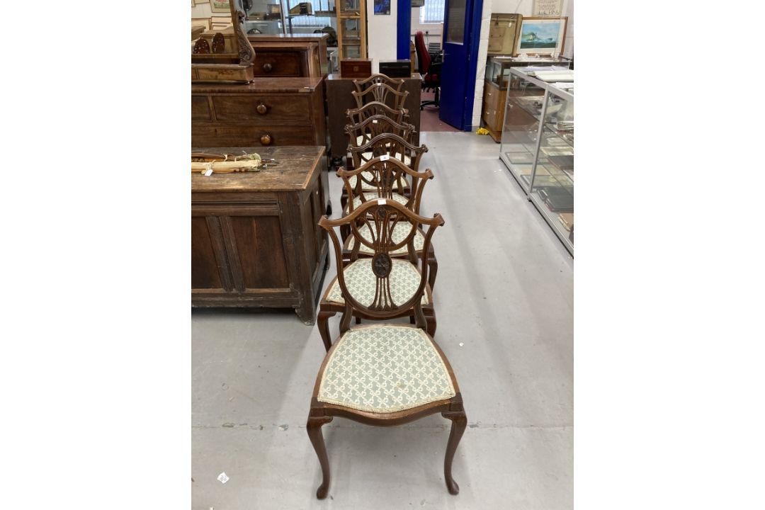 Edwardian inlaid mahogany Hepplewhite style chair, shield shaped backs, cabriole legs, two carvers