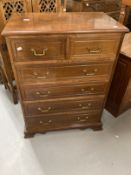 20th cent. Mahogany chest of two over four drawers with brass handles and bracket feet. 31ins. x