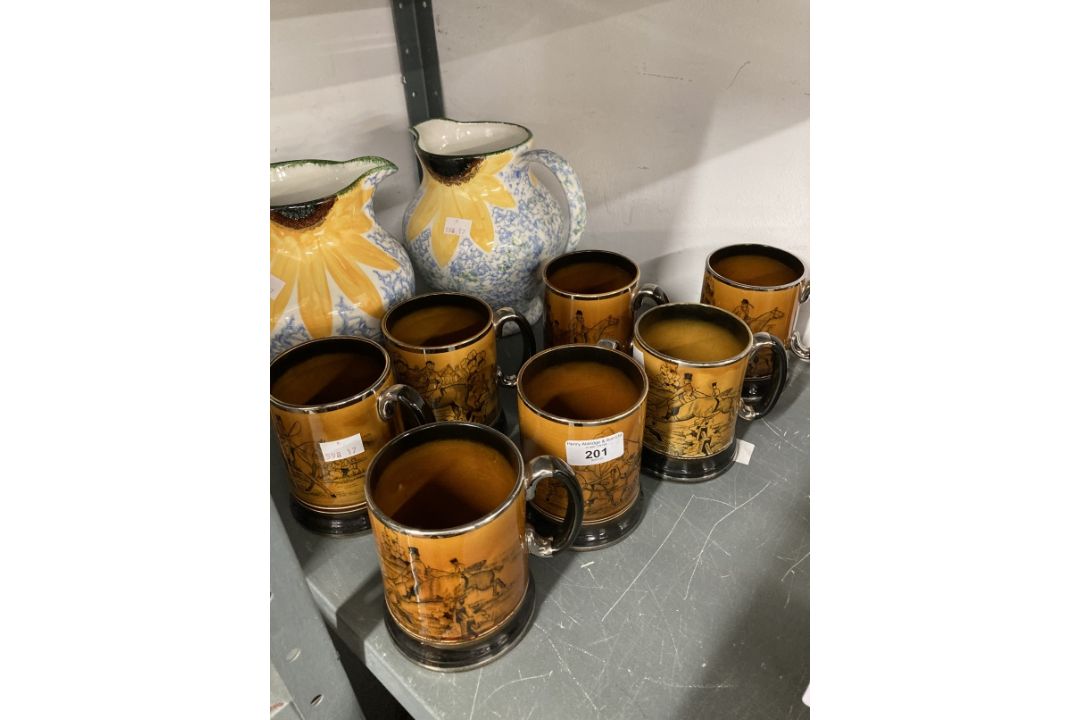 Ceramics: Poole pottery jugs decorated with sunflowers, a pair (½ins) and Arthur Wood mugs decorated