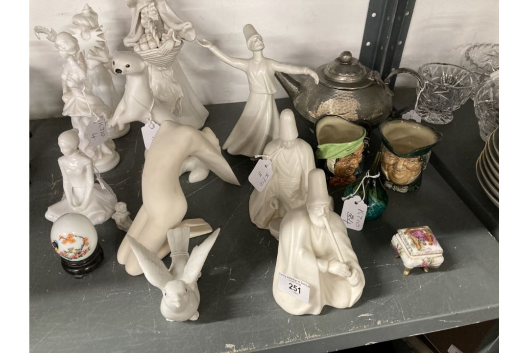 20th cent. Ceramics: Russian white stout figurine, white figurine of a street seller with basket