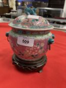 Chinese: Early 20th cent. Nyonya Straits porcelain covered jar decorated with poly chrome flowers on
