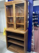 20th cent. Mahogany glazed top bookcase, two glass doors with three shelves above a glazed