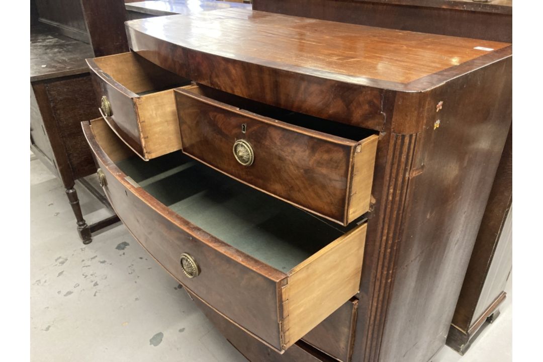 Early 19th cent. Mahogany bow front chest of two over three drawers with a cross banded top, round - Image 2 of 2