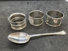 Hallmarked Silver: Teaspoon hallmarked Birmingham and three napkin rings one hallmarked London,