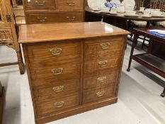 20th cent. Mahogany cabinet, cupboard door to one side, two drawers to the other, brass handles,