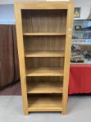 21st. cent. oak book shelf. 29½ins. x 68½ins. x 15½ins.