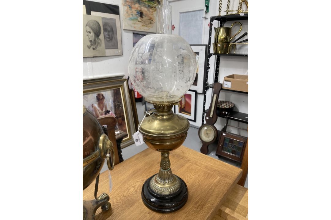 Early 20th cent. Brass oil lamp on a black porcelain mount, topped with a glass chimney and a - Image 3 of 3