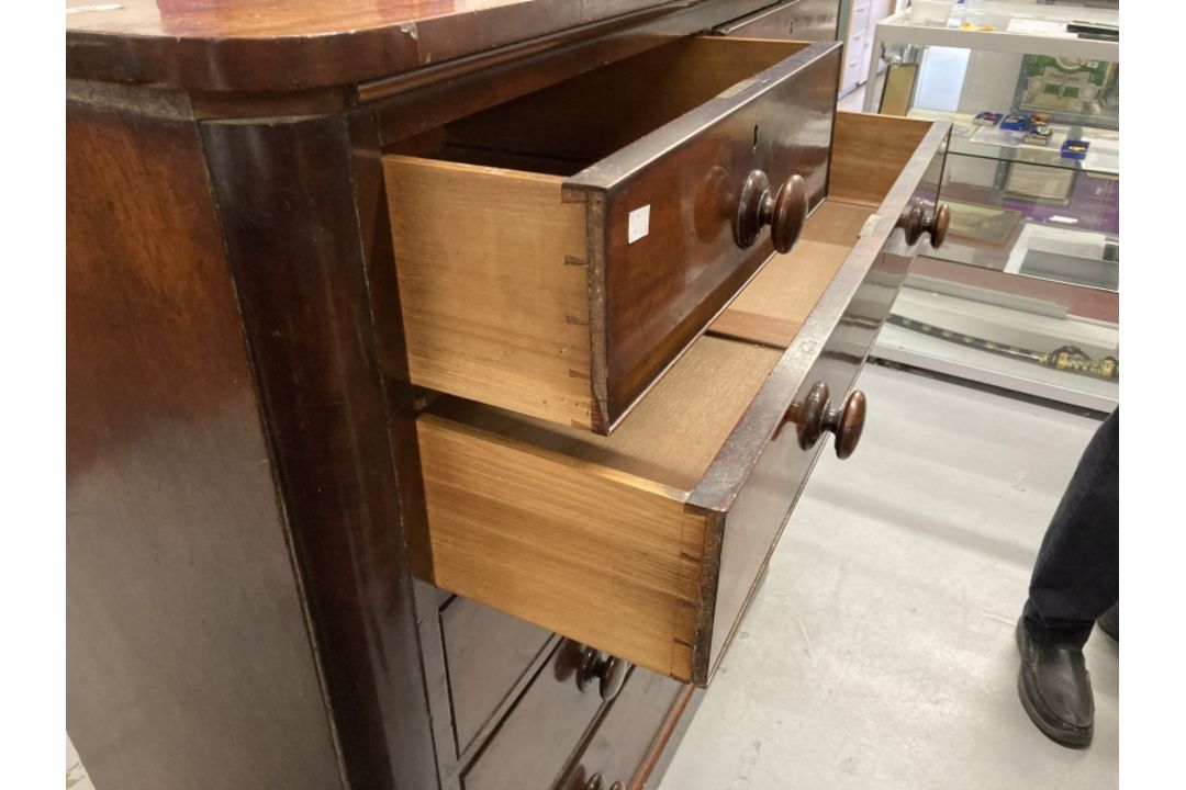 19th cent. Mahogany chest of two over four long drawers, turned knob handles on a plinth base. - Image 3 of 4