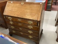 18th/19th cent. Fruitwood rustic bureau, satinwood decoration to the doors and drawers of the fitted