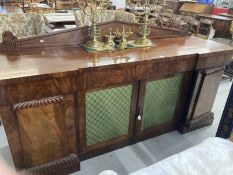 William IV mahogany break front sideboard, the top with arched gallery above four drawers, two