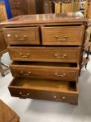 20th cent. Mahogany chest of two over four drawers with brass handles and bracket feet. 31ins. x