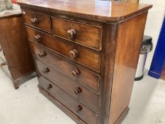 19th cent. Mahogany chest of two over four long drawers, turned knob handles on a plinth base.