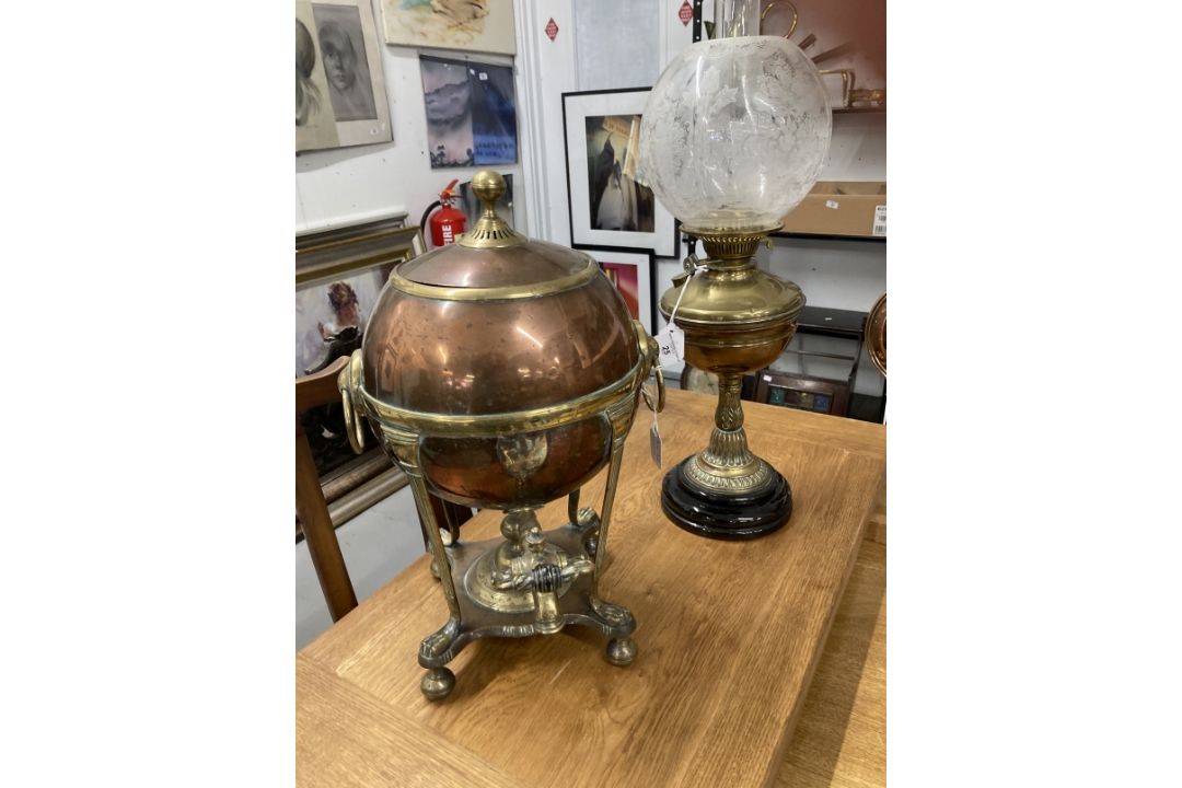 Early 20th cent. Brass oil lamp on a black porcelain mount, topped with a glass chimney and a - Image 1 of 3