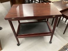 Danish Furniture: Arrebo Mobler/Grete Jalk for Poul Jeppesons rosewood folding top serving trolley/