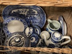 Pottery: Blue and white plates etc. Includes Willow pattern meat plate, Abbey ware tea caddy, etc.
