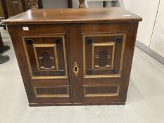 18th cent. Continental table cabinet with later adaptations, the two doors with arched panels