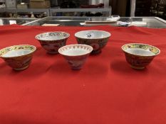 Chinese: Nyonya Straits porcelain small bowl decorated with a Phoenix among flowers, red character