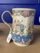 Late 18th cent. Staffordshire salt glazed mug, the slightly waisted form enamelled with flowering