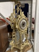 Clocks: 20th cent. Gilt metal clock in the French style.