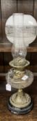 Victorian oil lamp black ceramic base, brass column, cut glass reservoir, etched shade. Stamped