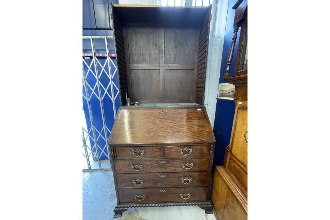 18th cent. Mahogany bureau bookcase, the bureau with hinged fall opening to reveal a fitted interior