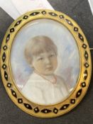 English School: c1900 miniature portrait of a girl, head and shoulders wearing a coral necklace,