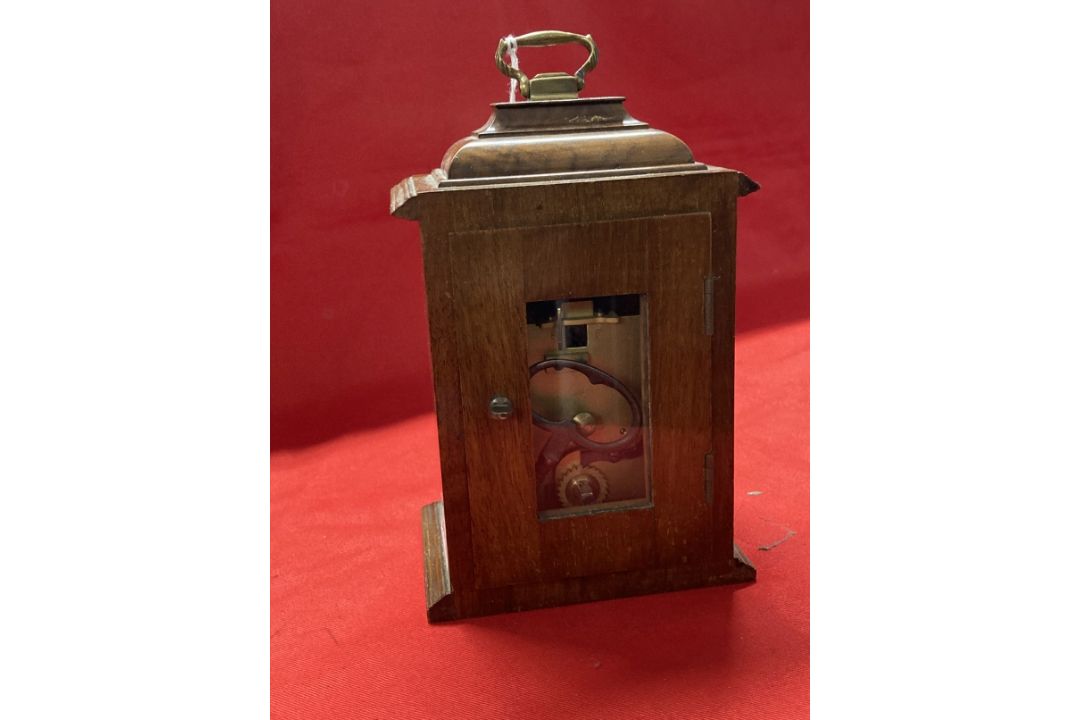 Clocks: 20th cent. Walnut bracket clock by Mercer with caddy top and brass carrying handle. 8ins. - Image 4 of 5