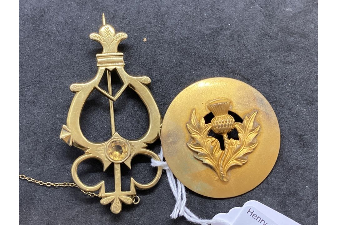 Scottish silver gilt kilt pins circular set with thistle plus another harp shaped set with a citrine - Image 1 of 5