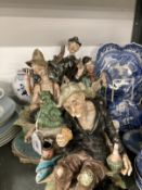 20th cent. Capodimonte figure groups, a tramp on a bench, two musicians and an angler at rest,