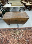 20th cent. Camphor wood marriage chest decorated with carved Oriental fishing boats. 37ins. x 17ins.