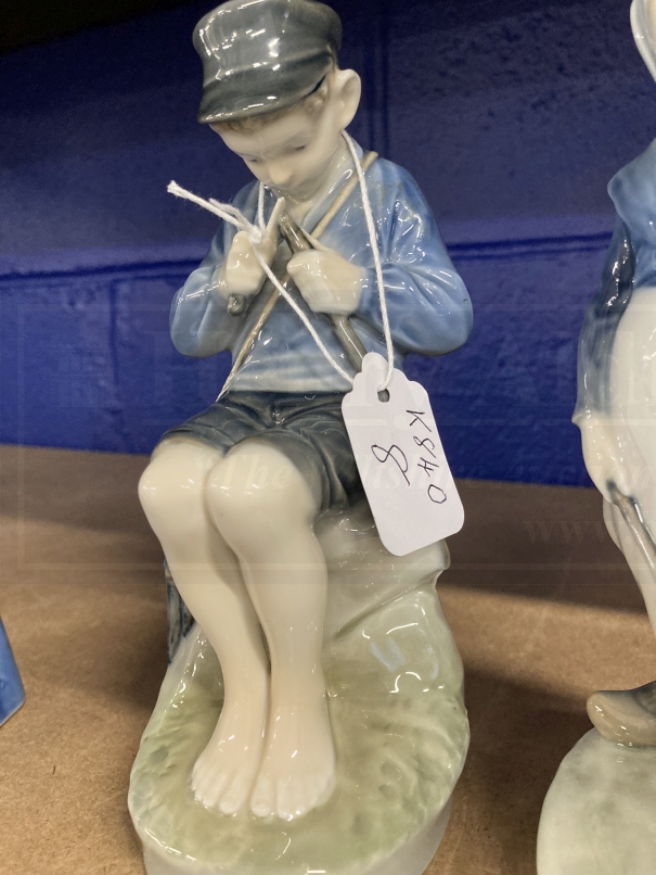 Royal Copenhagen: Boy whittling seated on a rock No. 905, plus goose girl No. 067/58. - Image 3 of 4