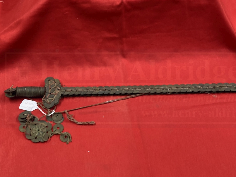 Weapons: Chinese coin sword, iron roil with Chinese coins of the 19th cent. tied to it with red - Image 2 of 3