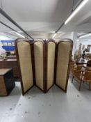 19th cent. Mahogany four fold campaign/travelling screen, the arched top carved with acanthus leaves