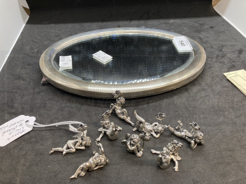 Hallmarked Silver: Oval mirror 9½ins. x 6½ins. Plus eight place name holders in the form of cherubs. - Image 2 of 4