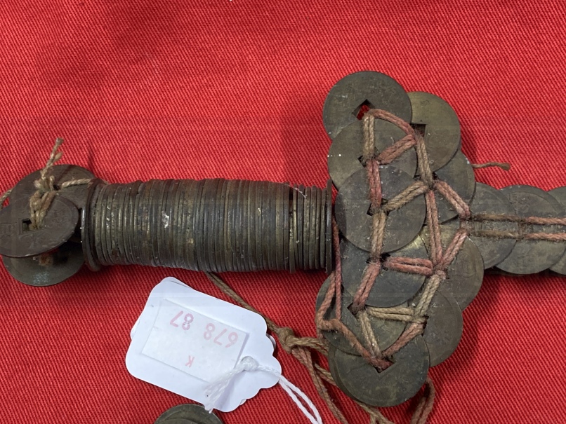 Weapons: Chinese coin sword, iron roil with Chinese coins of the 19th cent. tied to it with red - Image 3 of 3
