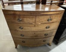 19th cent. Mahogany bow front chest of two short over three long drawers, ebony stringing, two