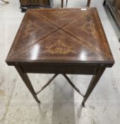 Sheraton Revival mahogany inlaid bridge/envelope table on tapering supports.