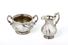A DANISH SILVER CREAM JUG AND TWIN HANDLED SUGAR BOWL