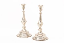A LARGE PAIR OF AUSTRIAN SILVER CANDLESTICKS