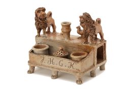A CONTINENTAL STONEWARE INKSTAND