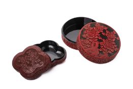 TWO CARVED CINNABAR LACQUERED BOXES AND COVERS
