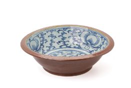 A BLUE AND WHITE CAFE AU LAIT GLAZED BASIN