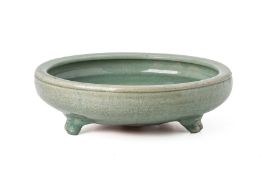 A CELADON GLAZED TRIPOD CENSER