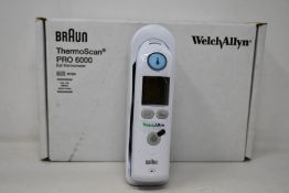 A boxed as new Welch Allyn Braun ThermoScan PRO 6000 ear thermometer with cradle.