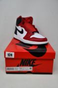 A pair of women's boxed as new Nike Jordan 1 Retro High Satin Snake Chicago Sneakers in gym red,