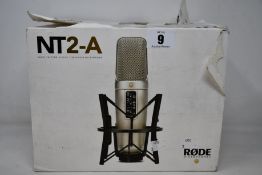 A Rode NT2-A multi pattern studio condenser microphone (Some damage to box).